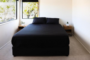 Luxe Modern Large Bedroom with Shared Kitchen and Amenities